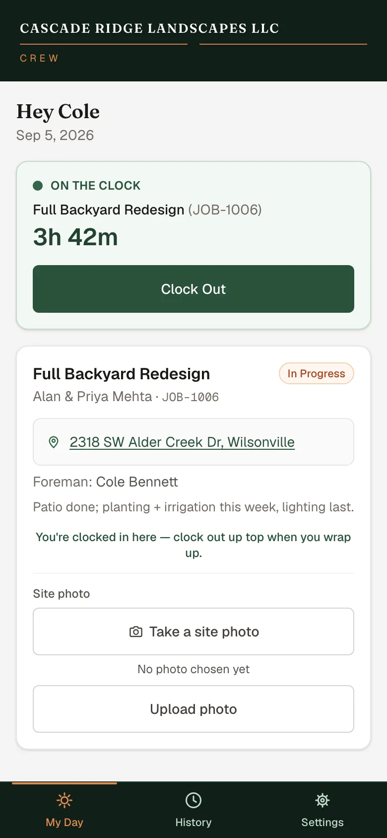 Crew app on a phone, sample data: “Hey Cole”, on the clock for 3h 42m on the Full Backyard Redesign job with a Clock Out button; below it the job card with the site address, the foreman and a site-photo upload, and the My Day, History and Settings tabs.